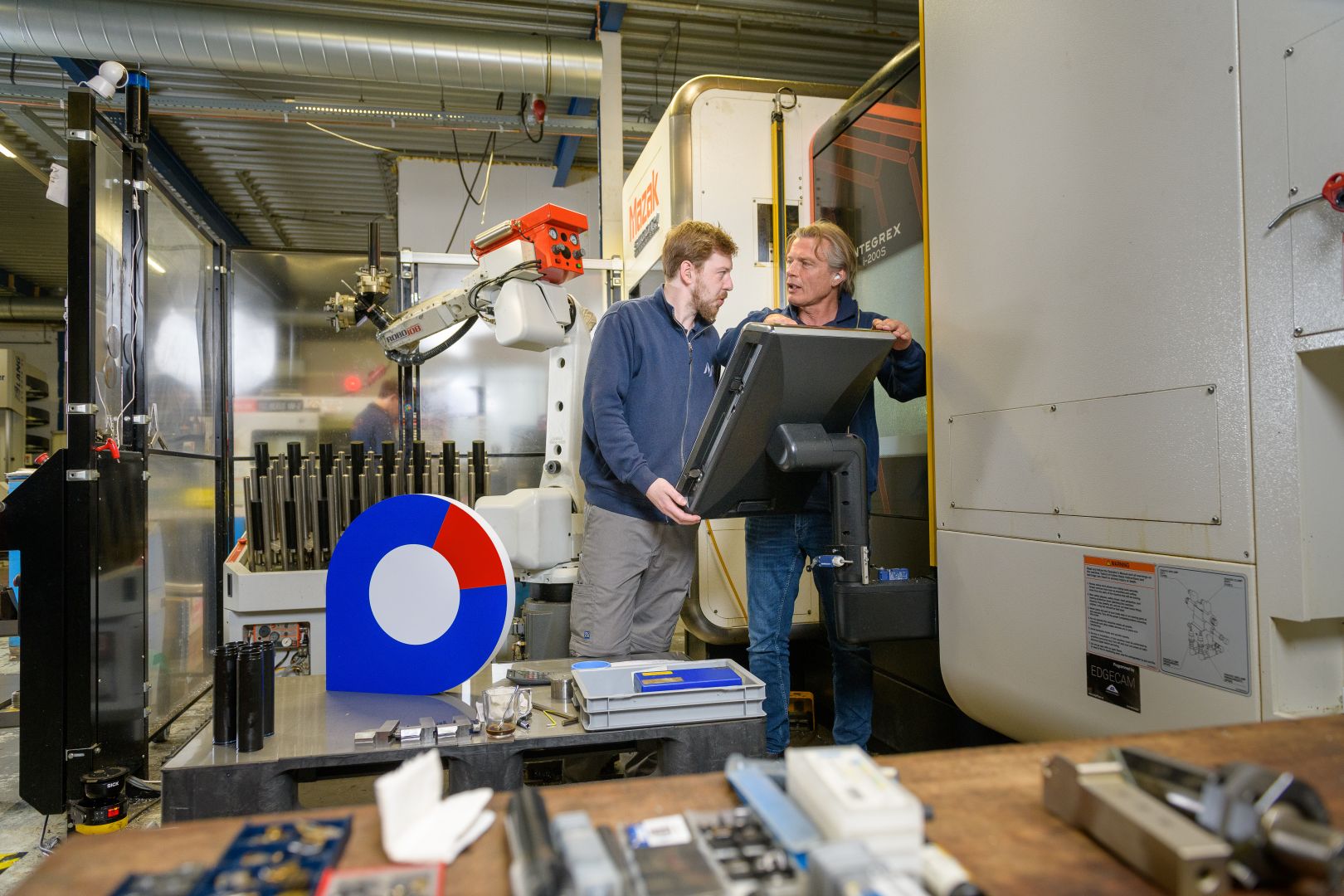 Werkgever in technische sector overlegt met werknemer